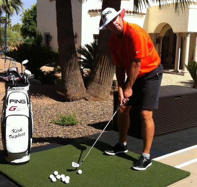 a golfer practicing swing